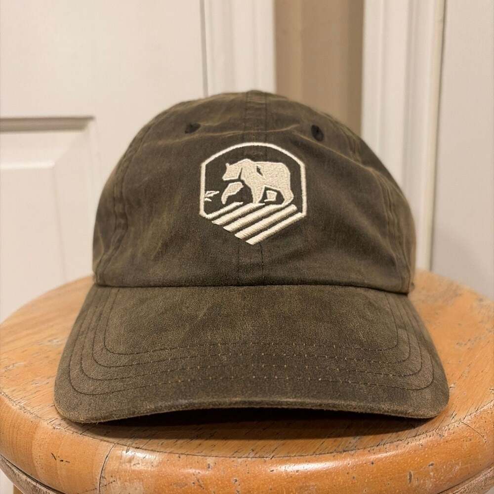 The Normal Brand Waxed Activewear Baseball Hat with Bear Logo Patch